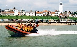 Coastal Voyage — speeding past Southwold lighthouse